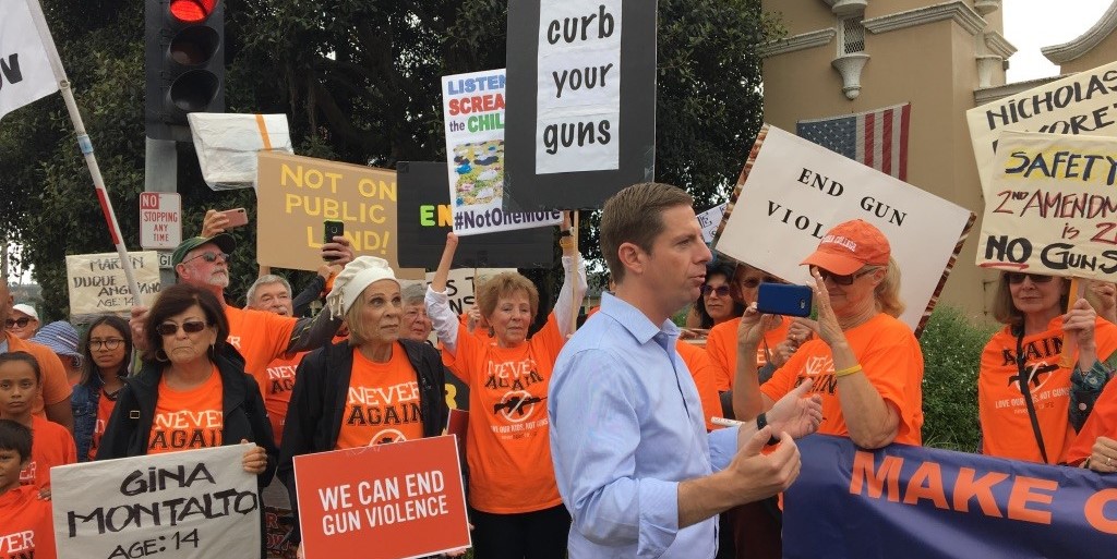 Rep. Mike Levin (D-CA50) addresses opponents of the gun show at the Del Mar Fairgrounds